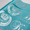 Graduation name ribbon, turquoise with silver printing.